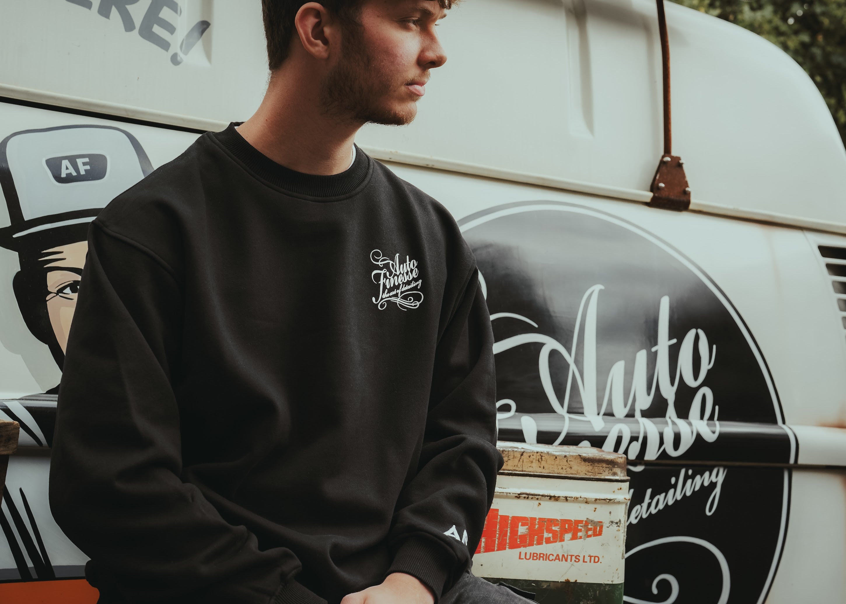 Man Wearing Signature Logo Sweatshirt_ front